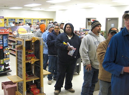 North Dakota oil workers-in-line