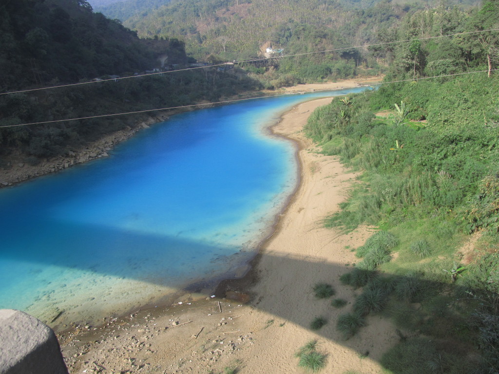 Pollution from coal mining in Meghalaya, India turns rivers the color of Gatorade. Caron emissions and pollution are prompting governments to act, finally, around the world. Photo/Keith Schneider